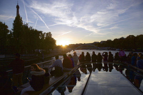 Watching the sunset over the Seine on a river cruise.