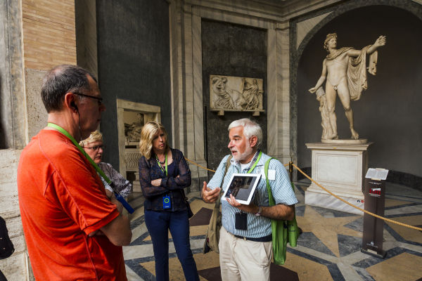 A guide discusses the Apollo Belvedere in the Vatican