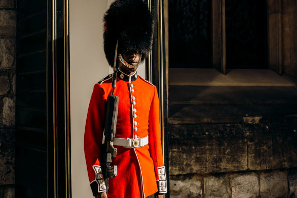 A regimental soldier standing guard.