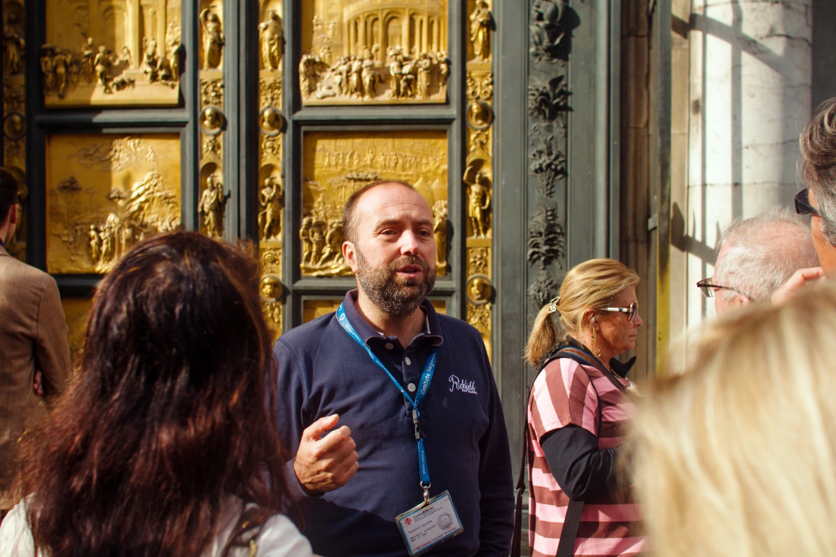 Showing off the famous Gates of Paradise on the Florence Baptistery