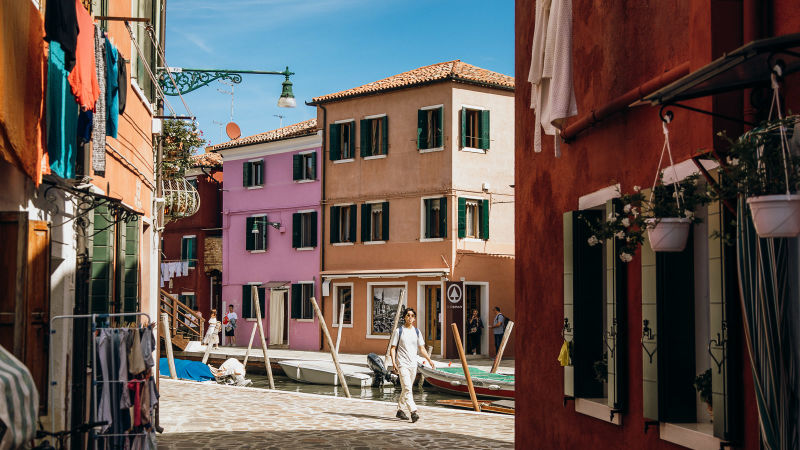 Burano is famed for its colorful houses and scenic waterways.