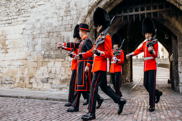 Accompanied by regimental guards, they depart from the Traitor's Gate.