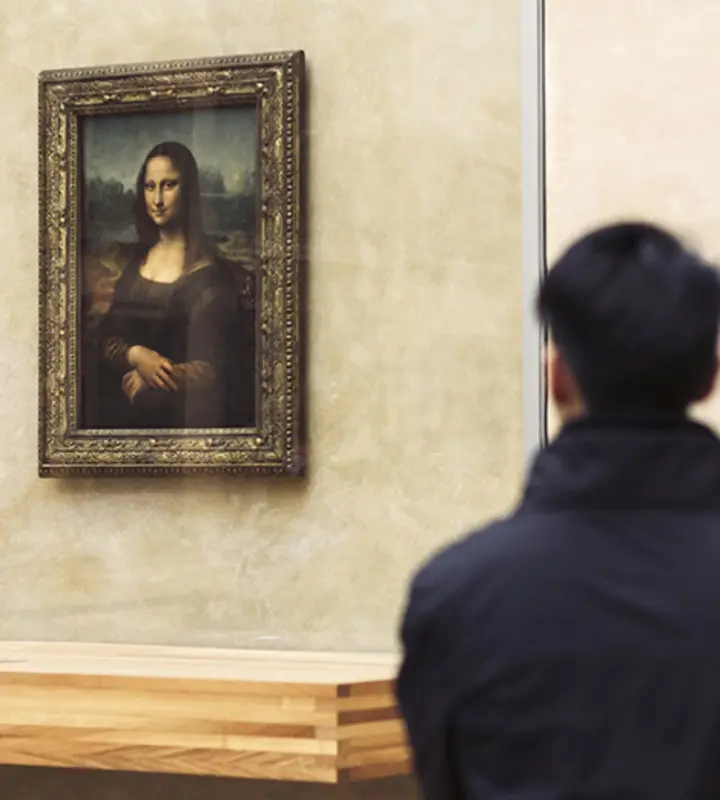 Visit the Mona Lisa at her quietest time of day on our Louvre tour
