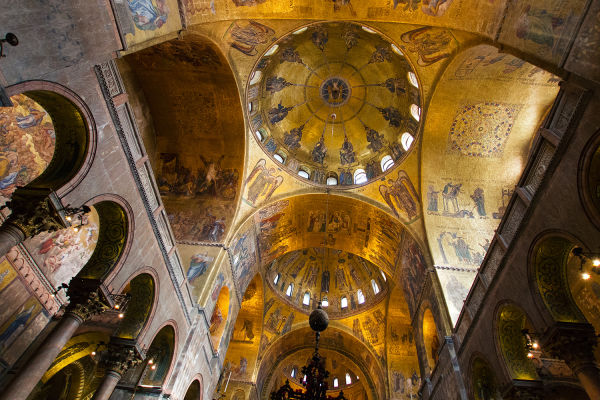 The Byzantine architecture and decoration in St. Mark's Basilica make it one of the most unique holy places in Italy