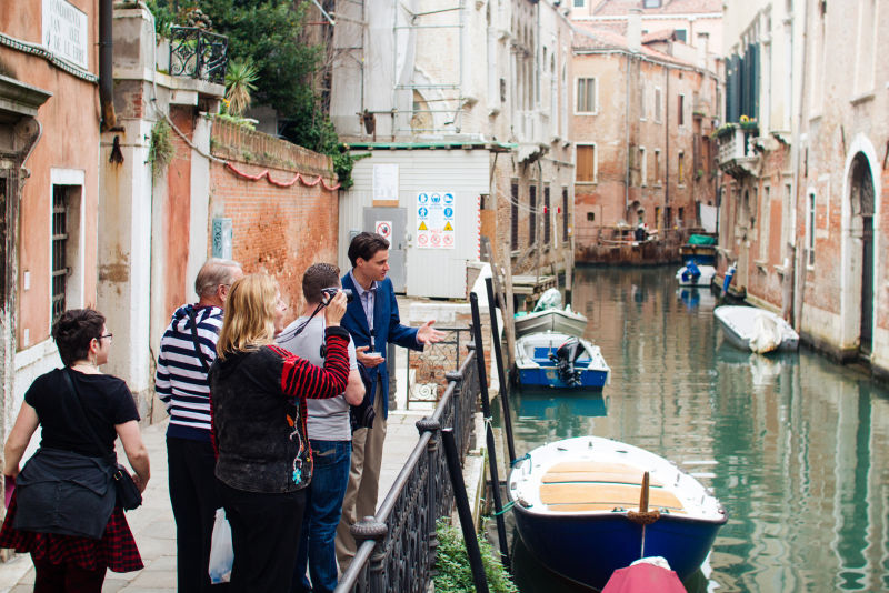 Exploring the canals of Venice with an expert guide