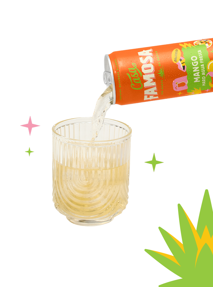 Mango flavor Casafamosa being poured into a glass.