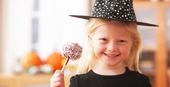 Kid holding Halloween treat