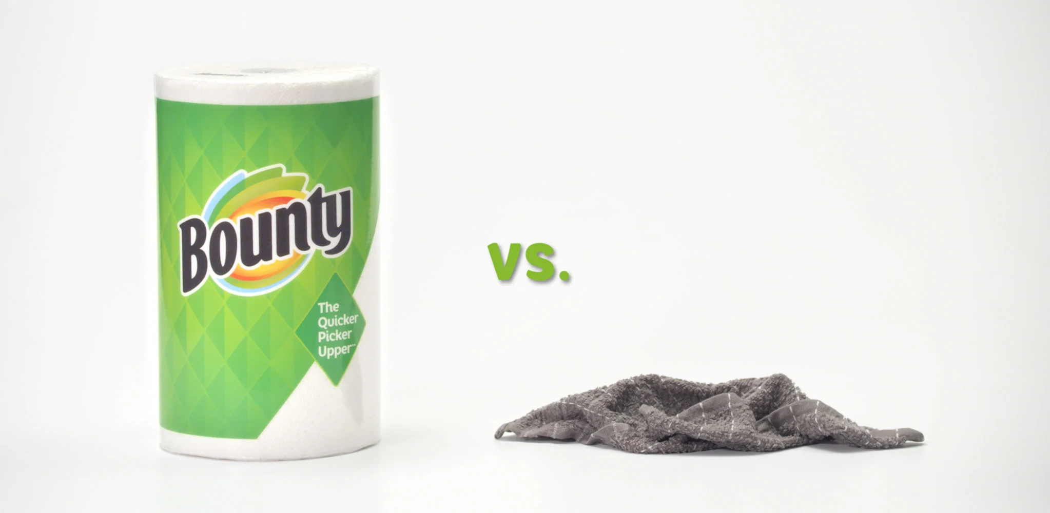 A roll of Bounty paper towels next to a used dishcloth
