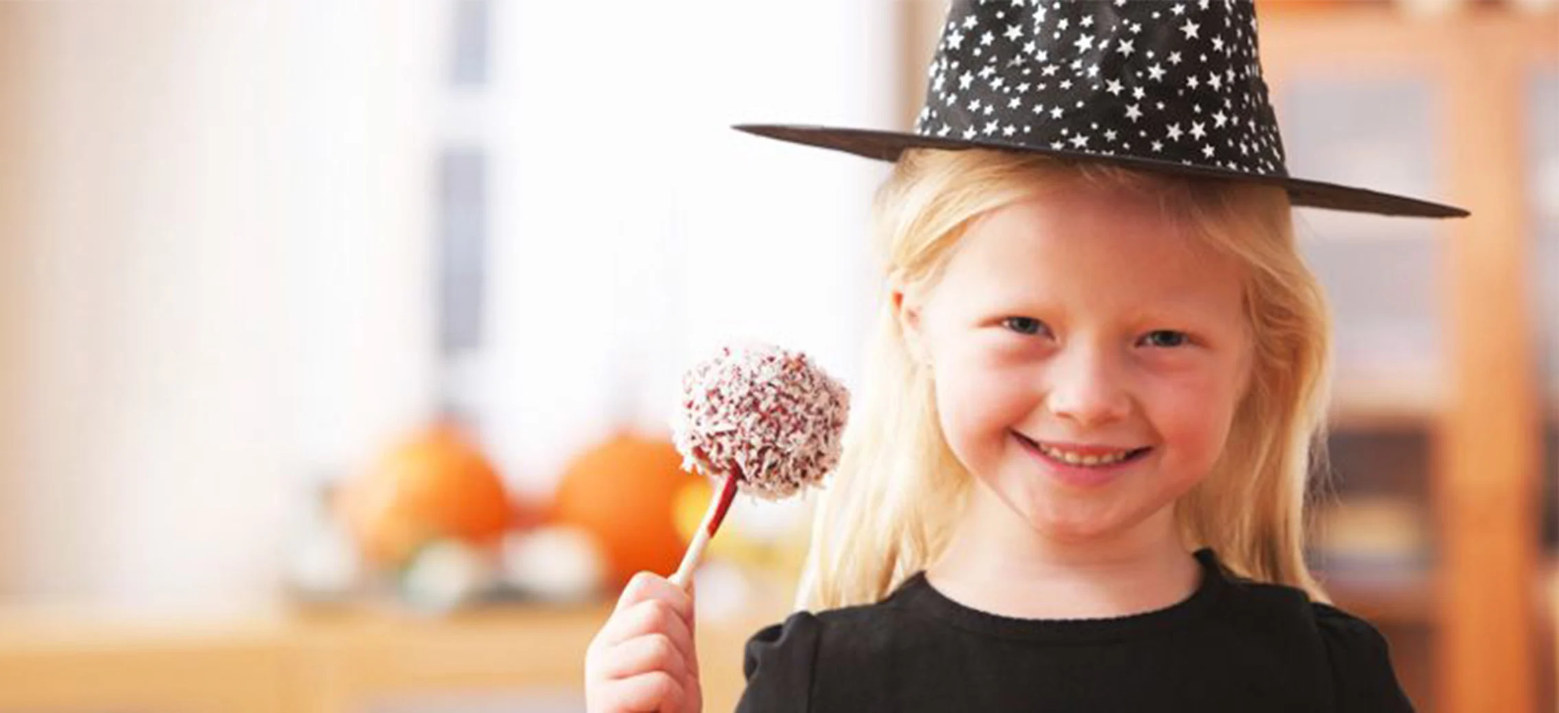 Kid holding Halloween treat