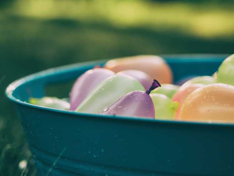 Bucket of colorful water balloons — lots of UTIs!