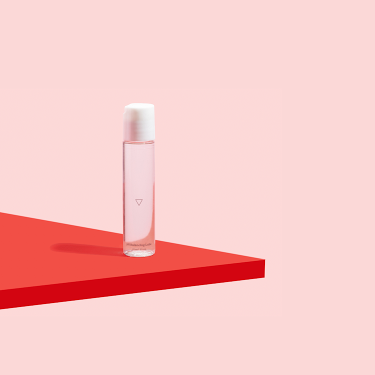 a bottle of harmonizing lube from wisp