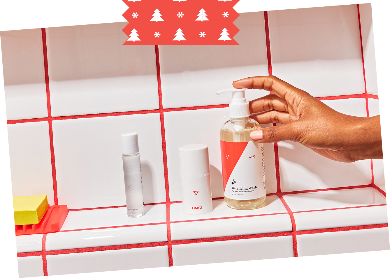 OMG Cream, lube, and balancing wash on a shower ledge