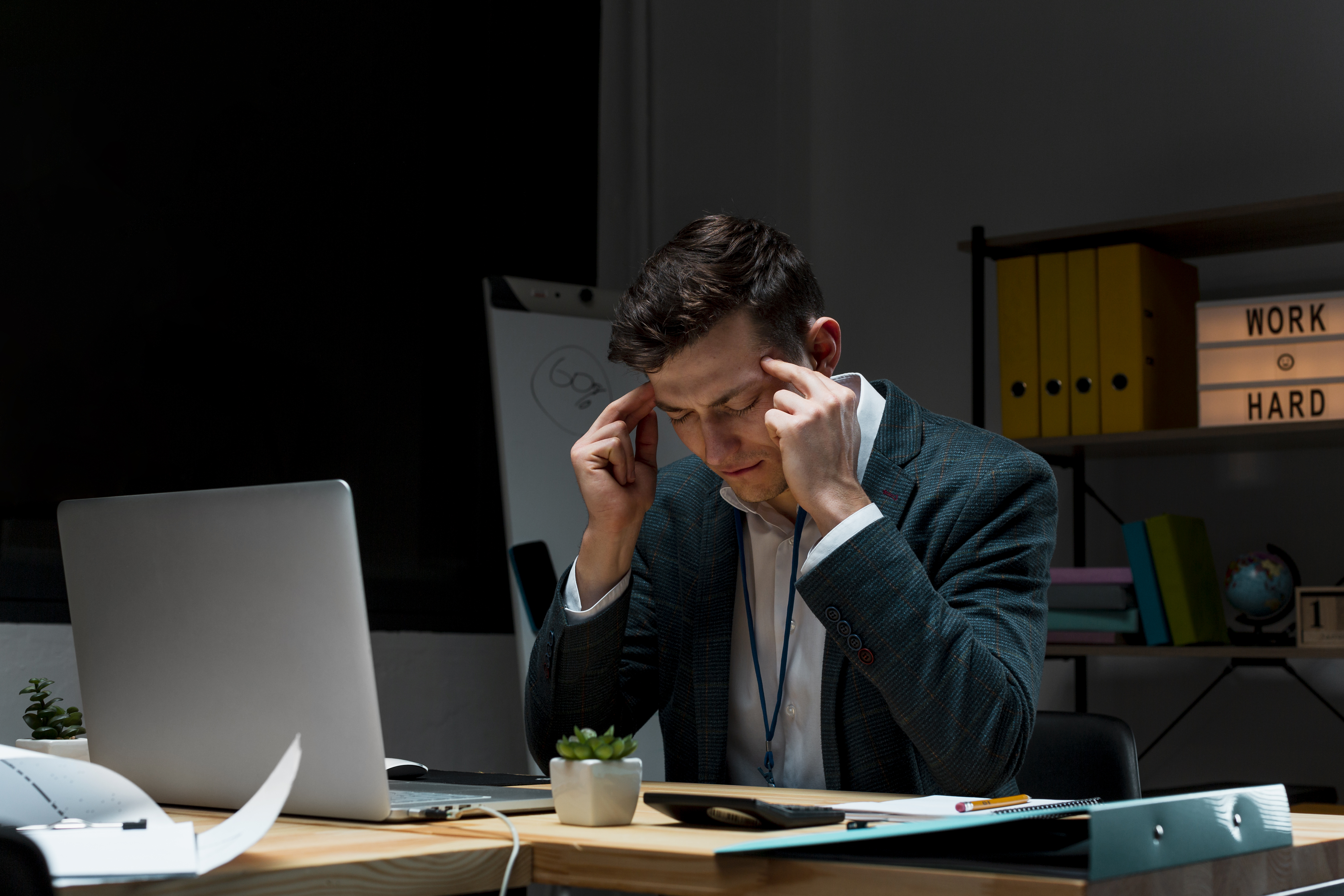 portrait-adult-male-focusing-work-night