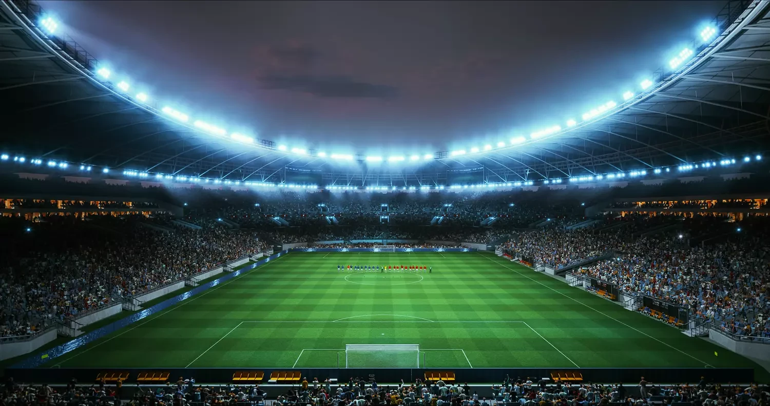 Volles Fußballstadion bei Nacht
