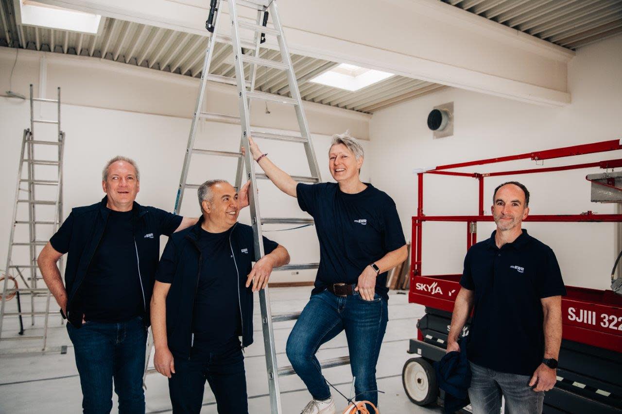 Titelbild alt = "Das Team von EWR One auf der Baustelle'