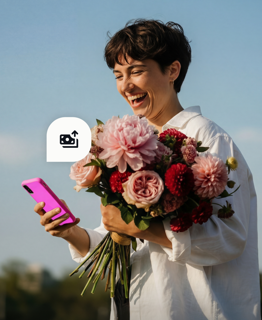 Image of a person holding a bouquet of pink and red flowers, holding a pink smartphone in their other hand, and an icon indicating a payment has been made