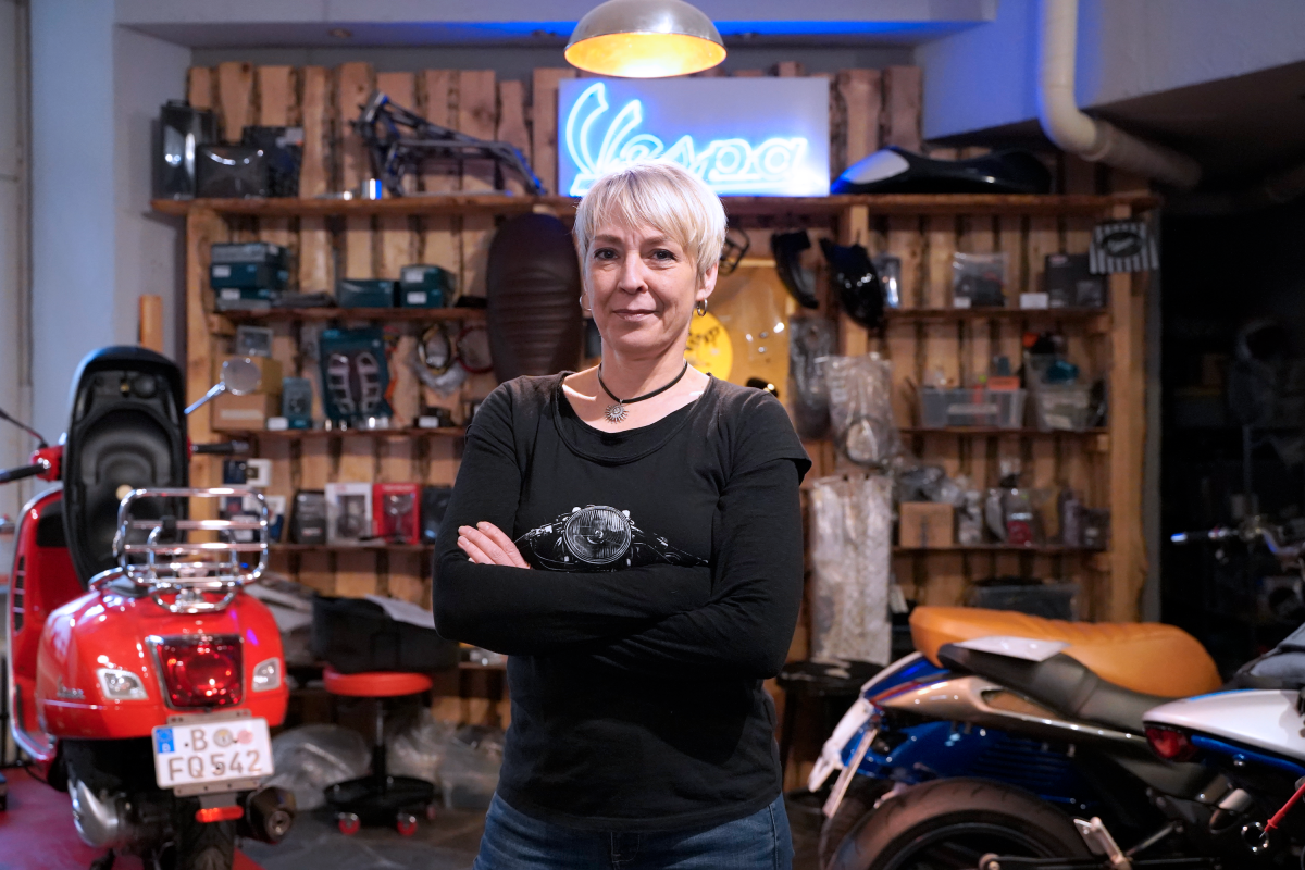 Carola, the owner of the motorcycle shop Cafe Racer 69 in Berlin, Germany