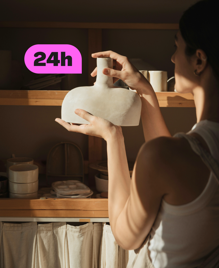 Lady holding a piece of pottery