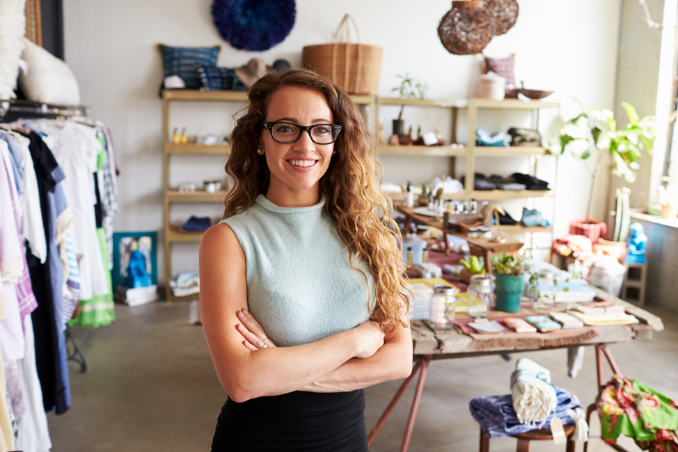 Happy businesswoman in her store.