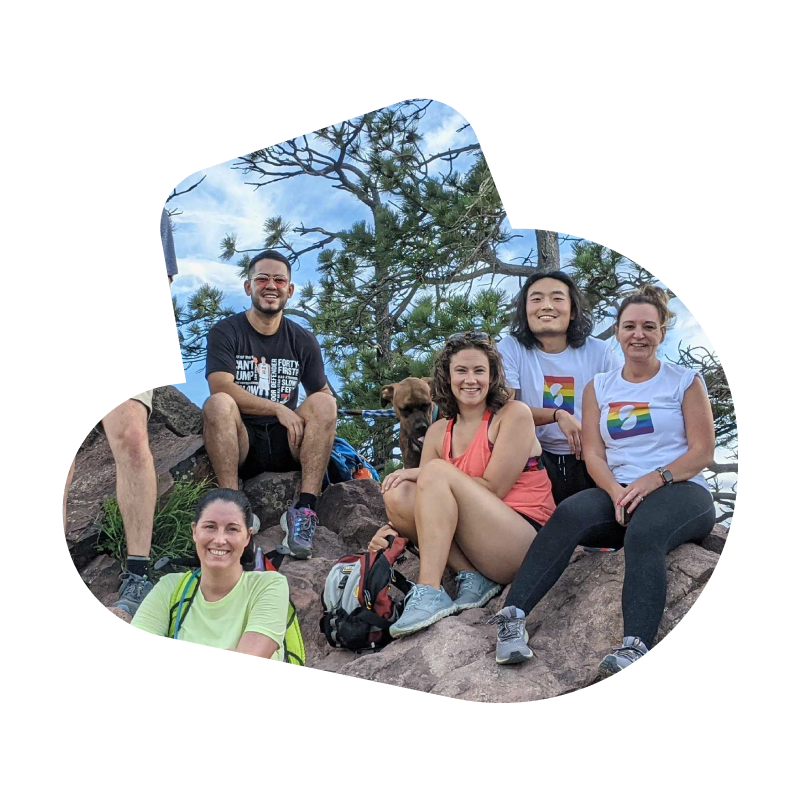 A diverse group of SumUp team members in the nature in Boulder