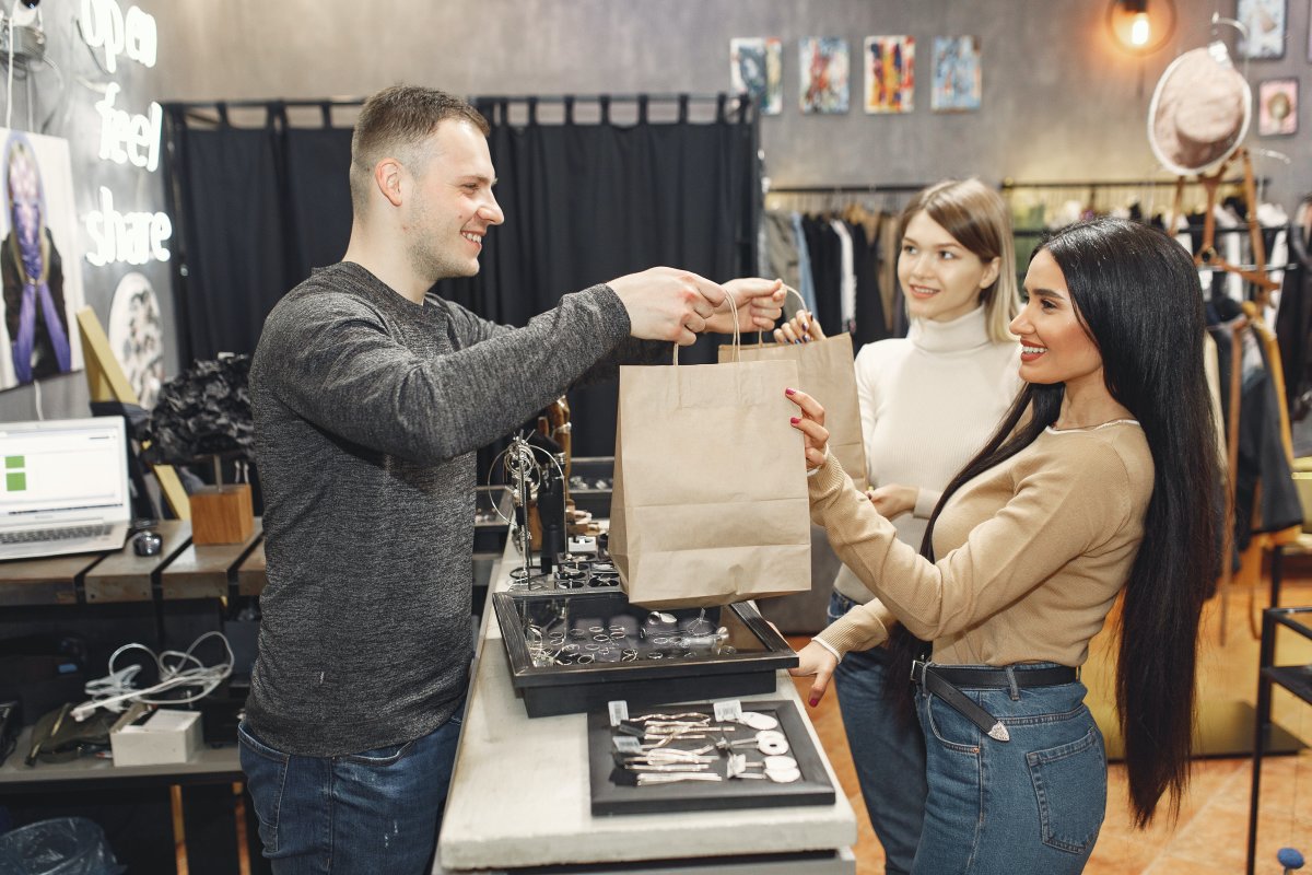 Women buying clothes in a shop 