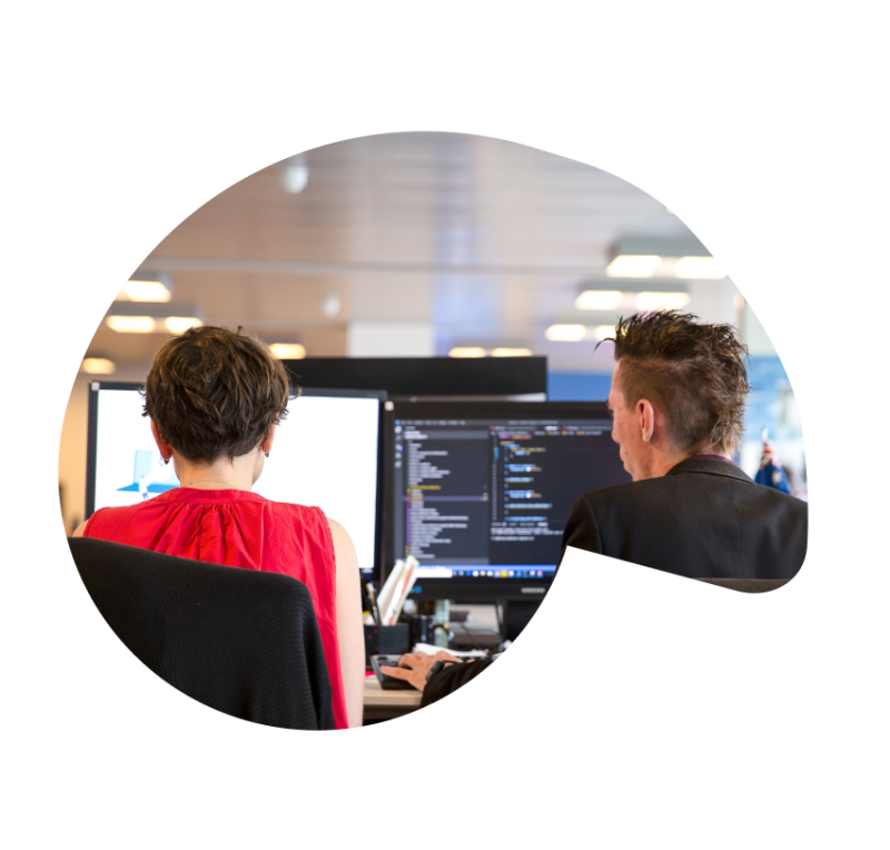 2 employees working in front of a computer in the SumUp office in Copenhagen