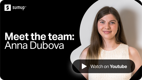Artwork with text reading "Meet the team: Anna Dubova" with a young female SumUpper wearing white short and long hair.