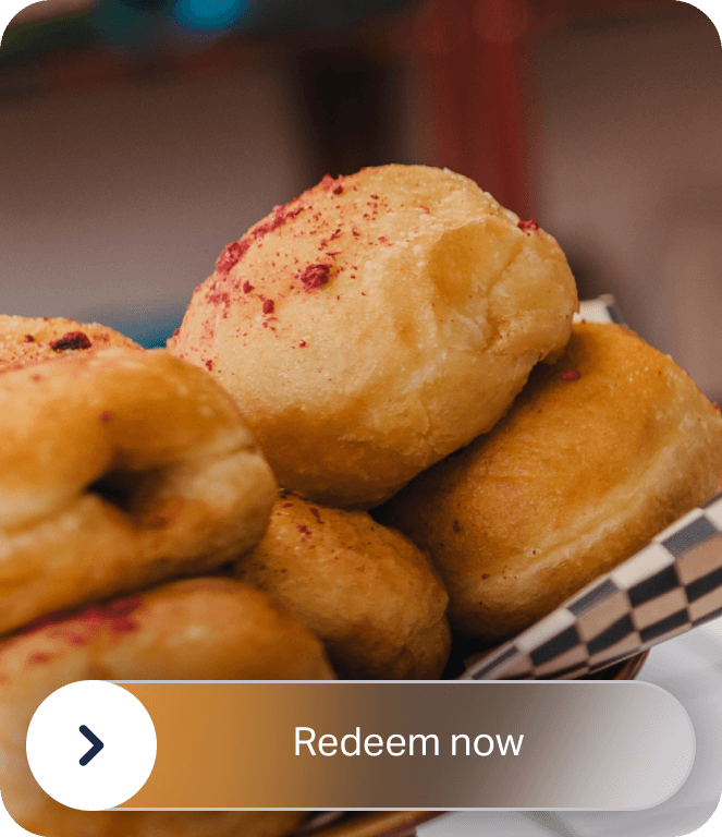 Image with donuts and “Redeem now” button