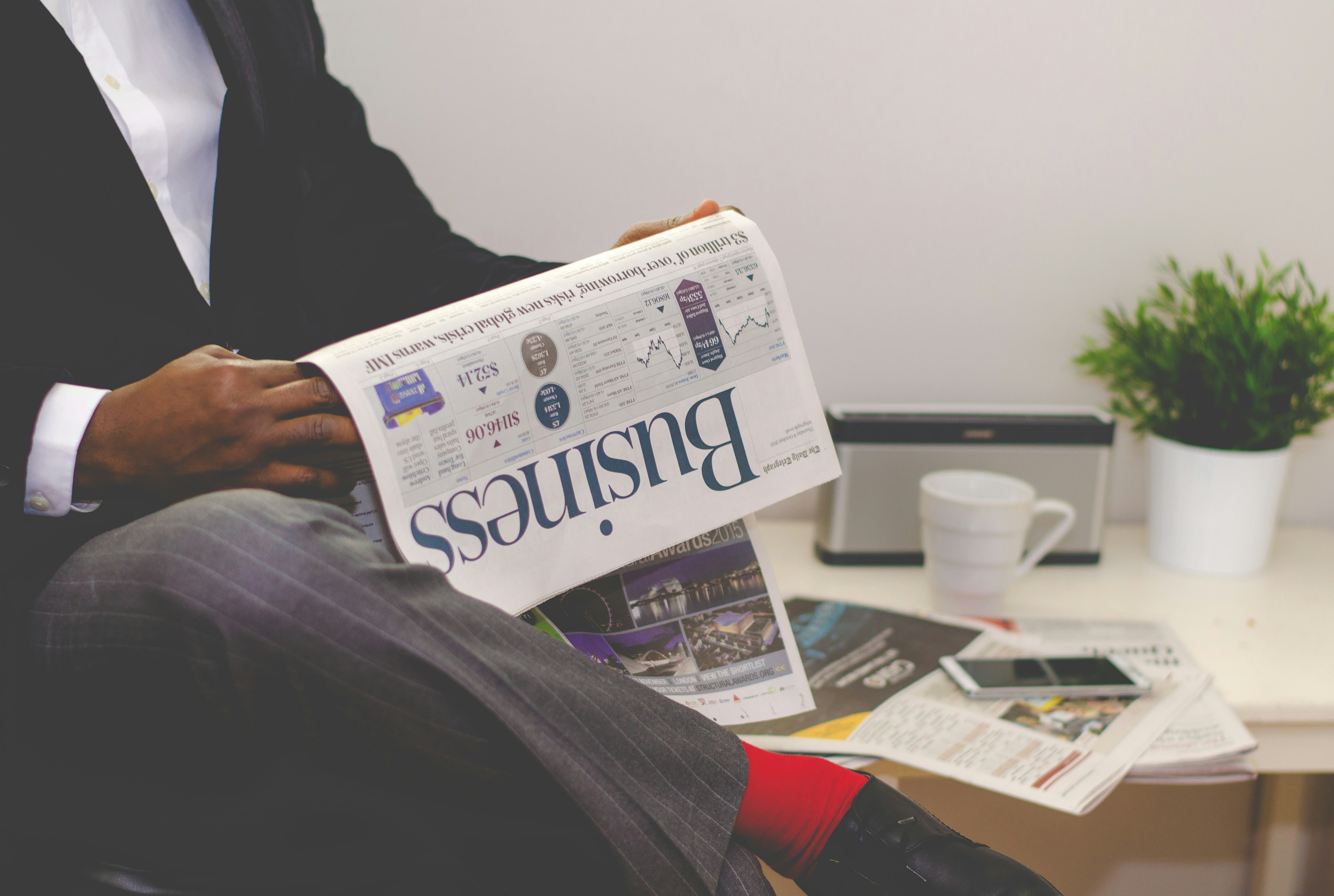 Man reading the business news