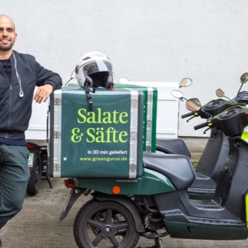 food delivery driver with moped