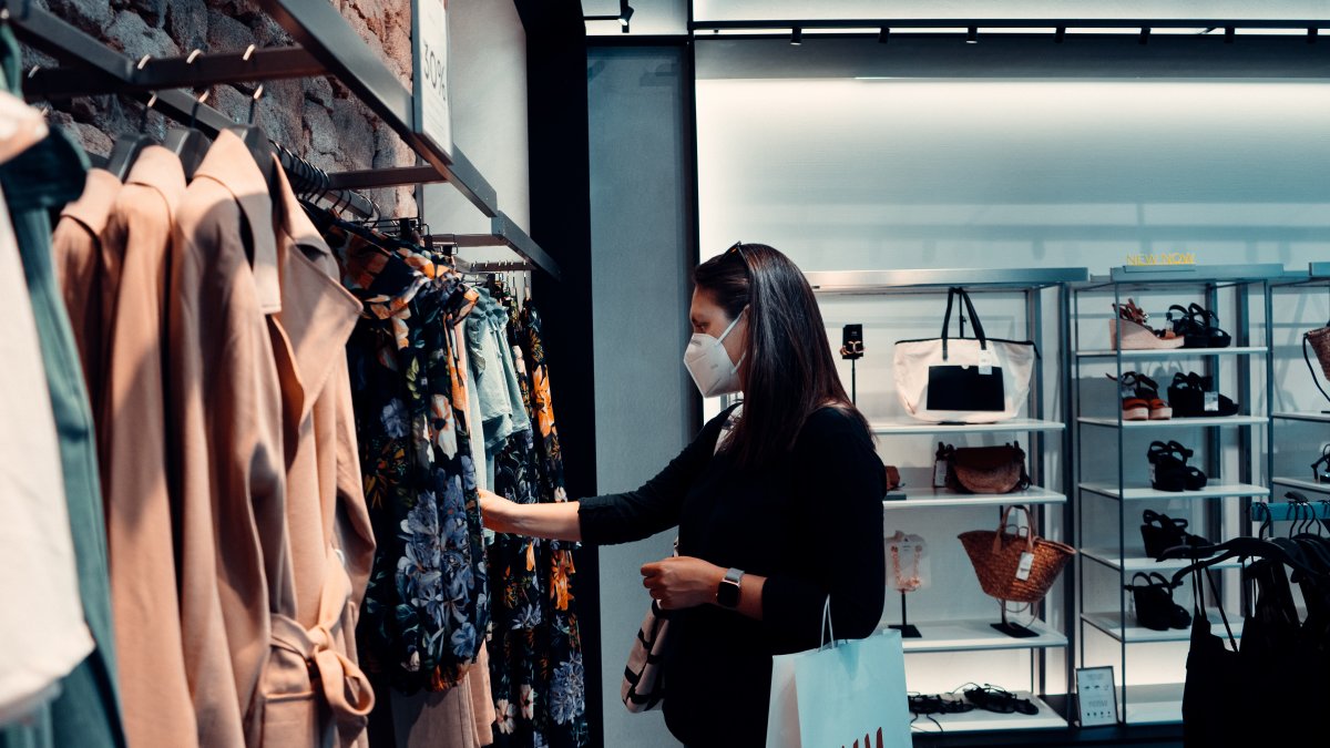 Woman shopping in mask