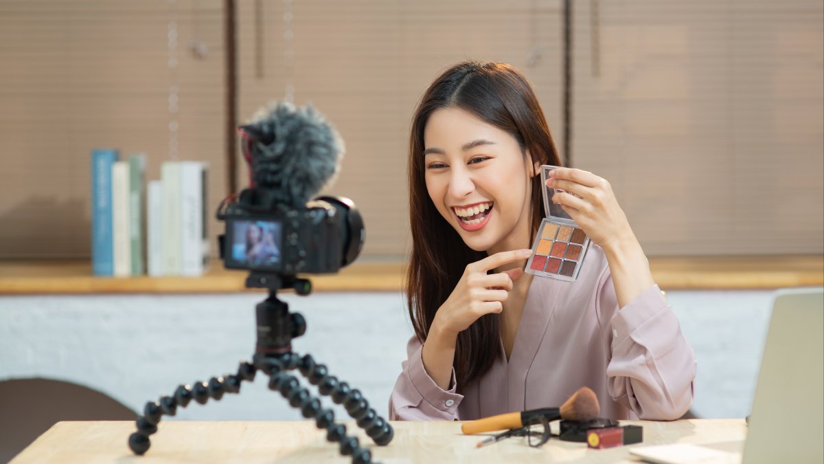 Woman promoting a product on camera