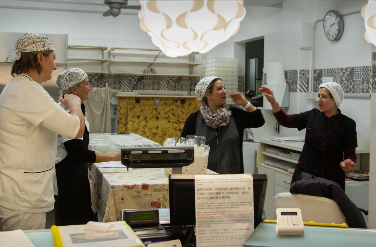 four women in a happy work environment