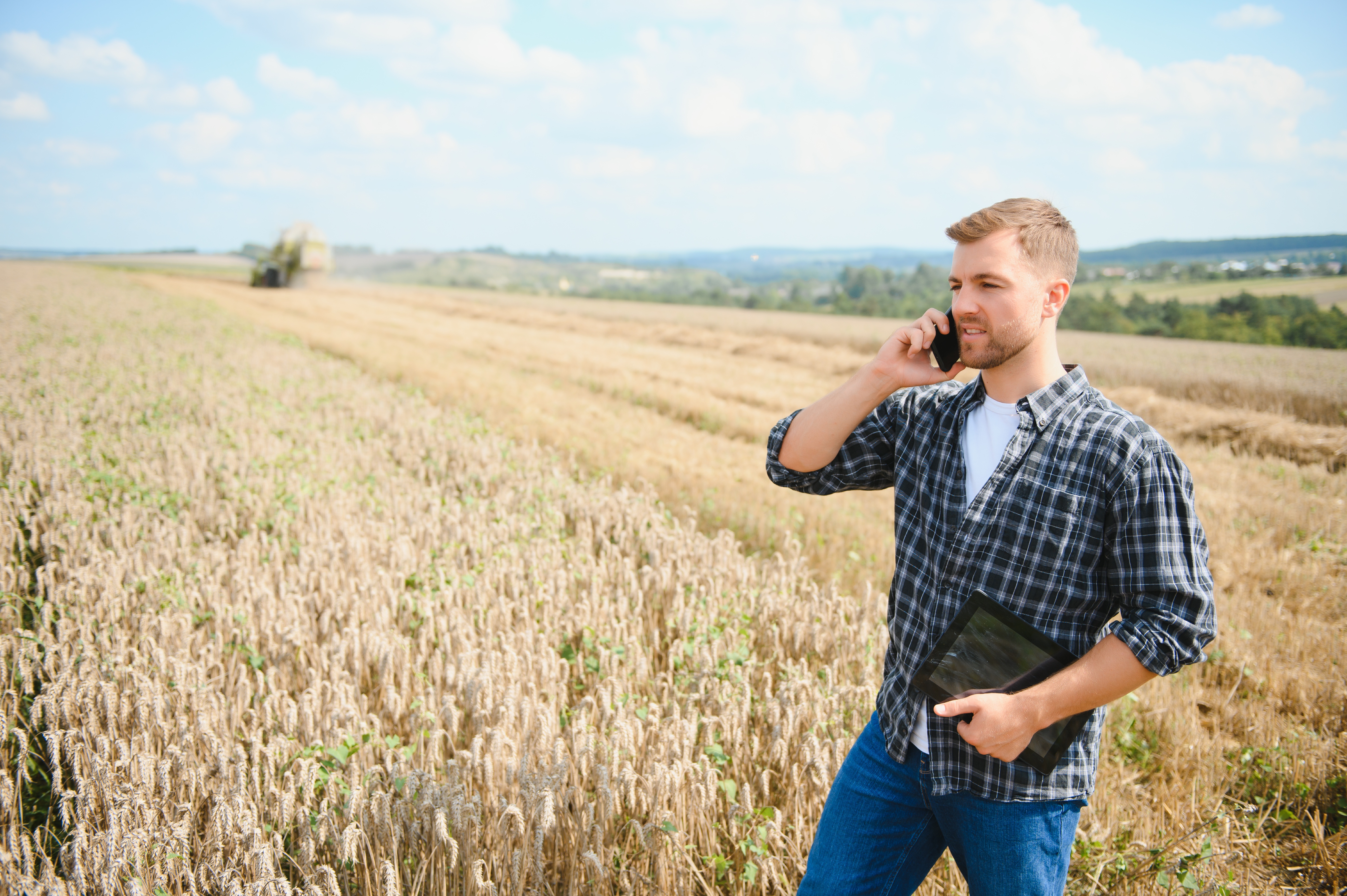 handsome-farmer-with-tablet-standing-in-front-of-c-2024-02-14-13-01-06-utc.jpg