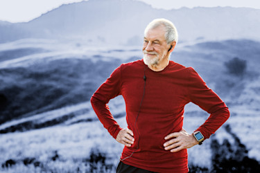 senior man hiking in mountains