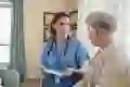 Nurse and patient talking