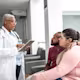 Couple talking to a doctor