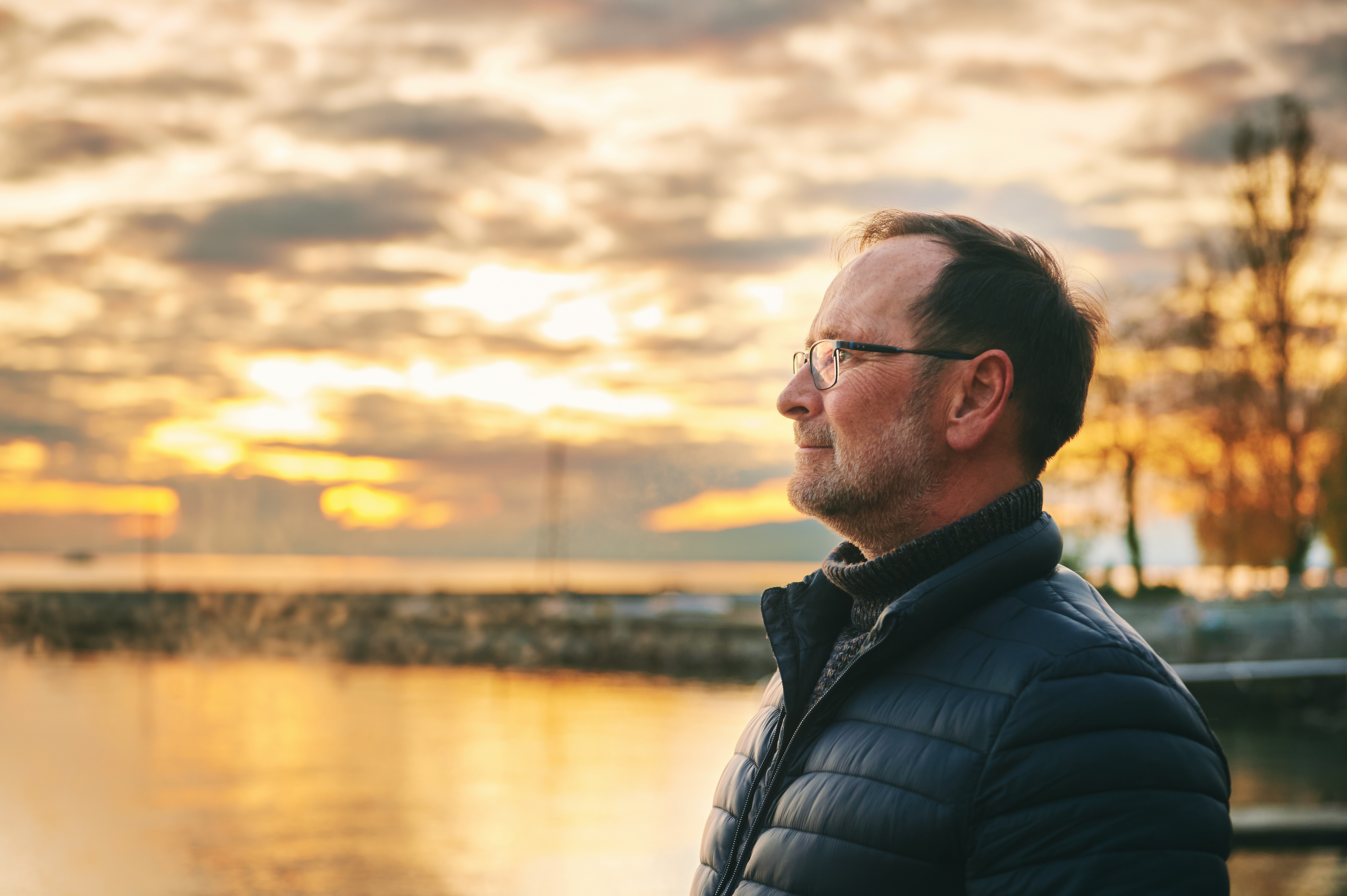 Middle age man watching the sunset