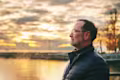 Middle age man watching the sunset
