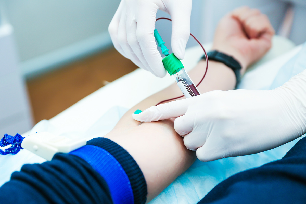 Doctor Shows The Process Of Scanning A Patient Stock Photo