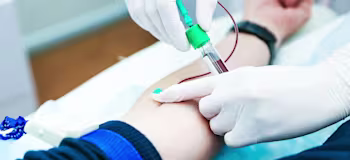 Doctor takes the patient's blood