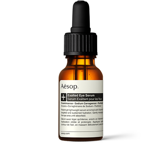 Exalted Eye Serum in an amber glass bottle with a pipette. 