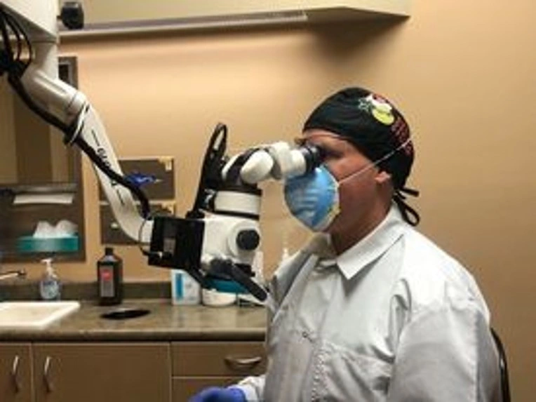 Chair Positioning Using a Microscope The Concepts of Fourhanded