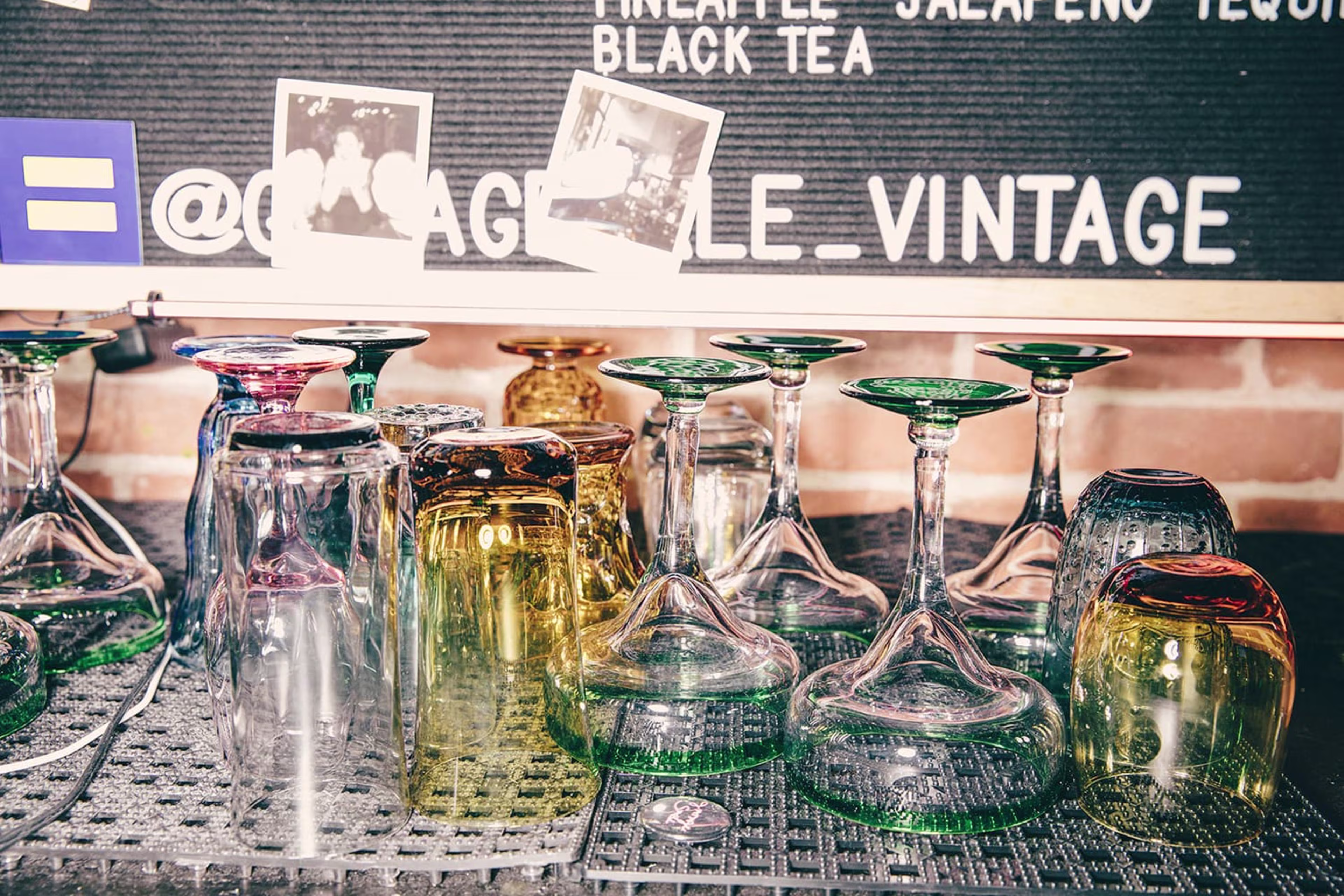 Upside-down glassware on a bar mat