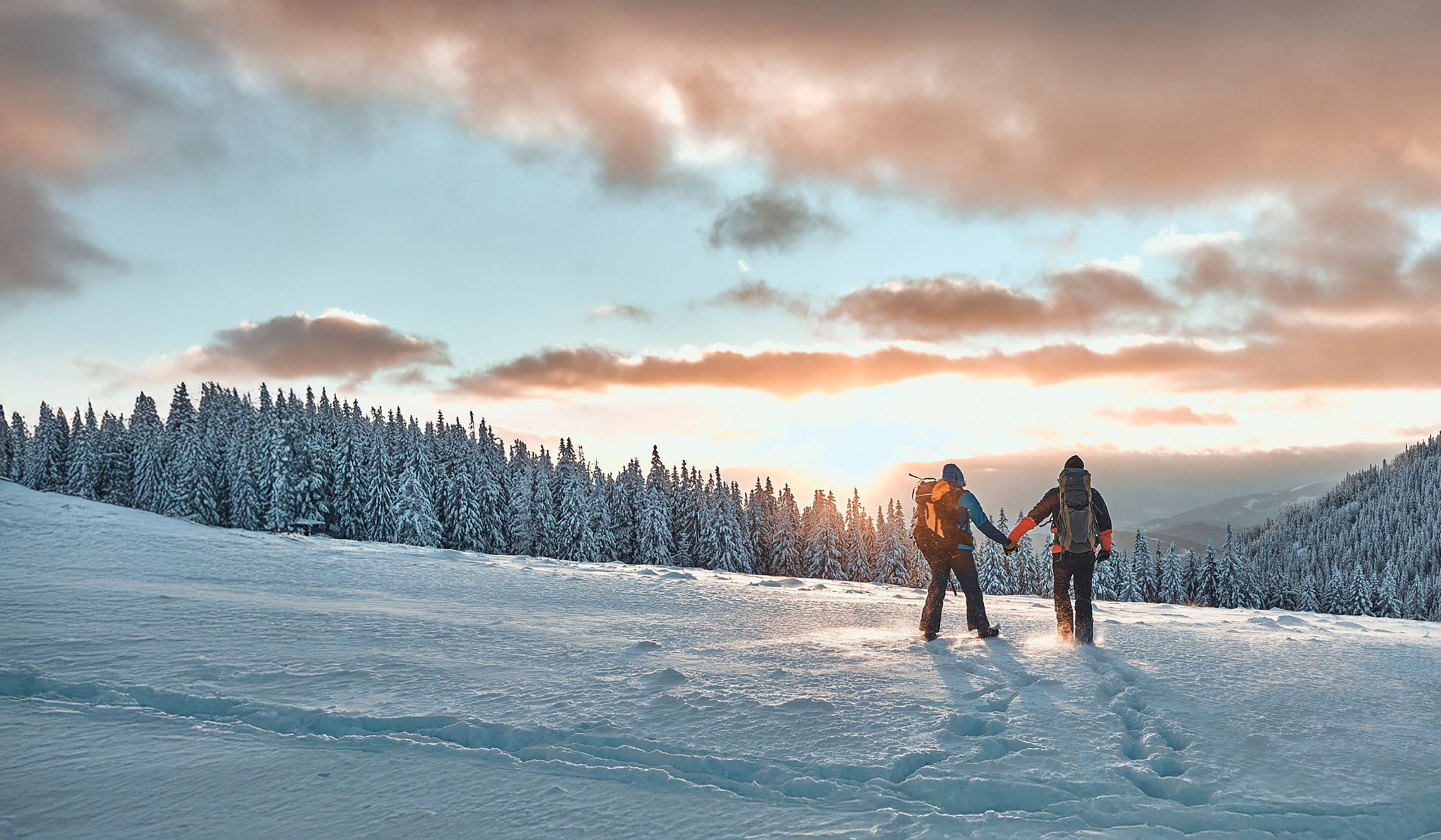 Couple enjoying Colorado Snowy Mountains with Westerra Credit Union as their local bank. 