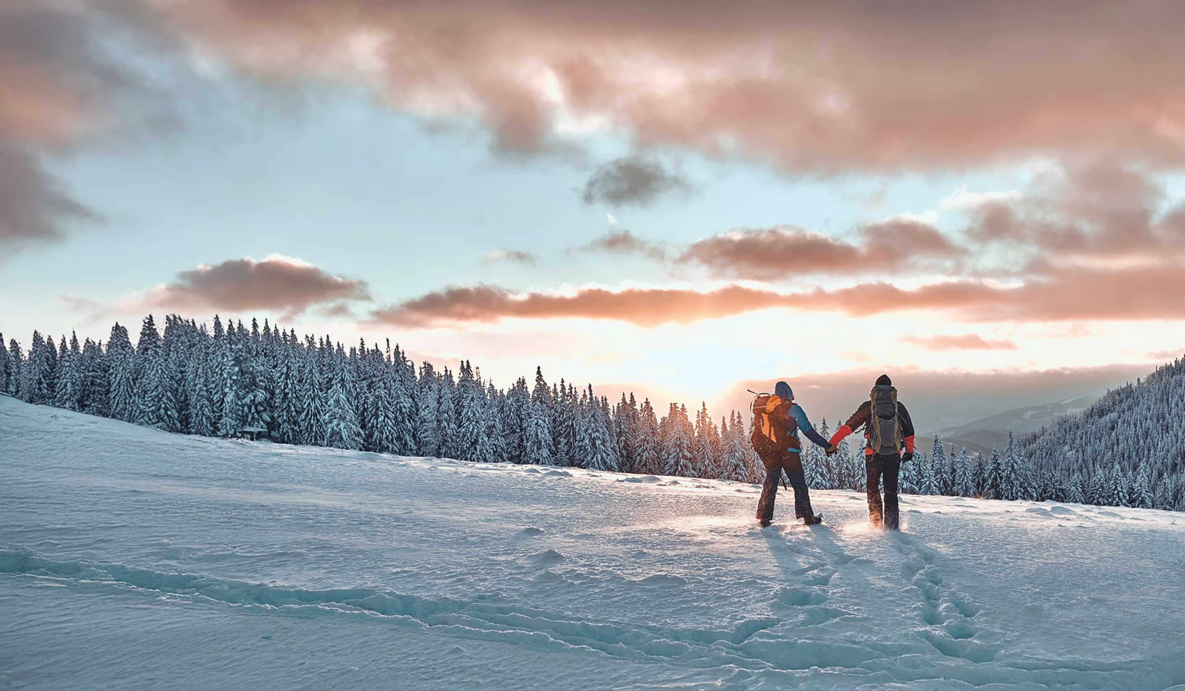 Couple enjoying Colorado Snowy Mountains with Westerra Credit Union as their local bank.