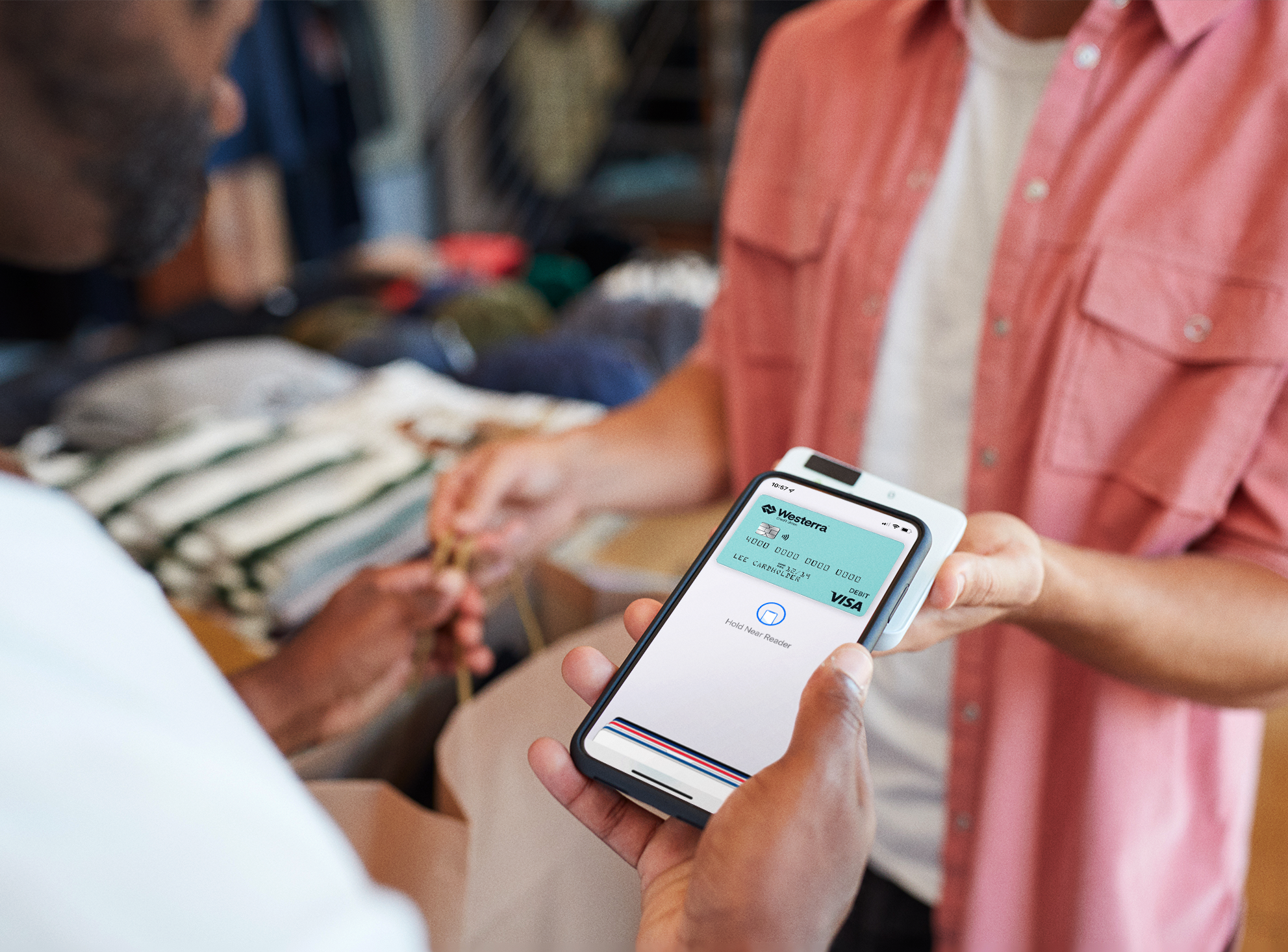 Customer using their phone to pay in a store