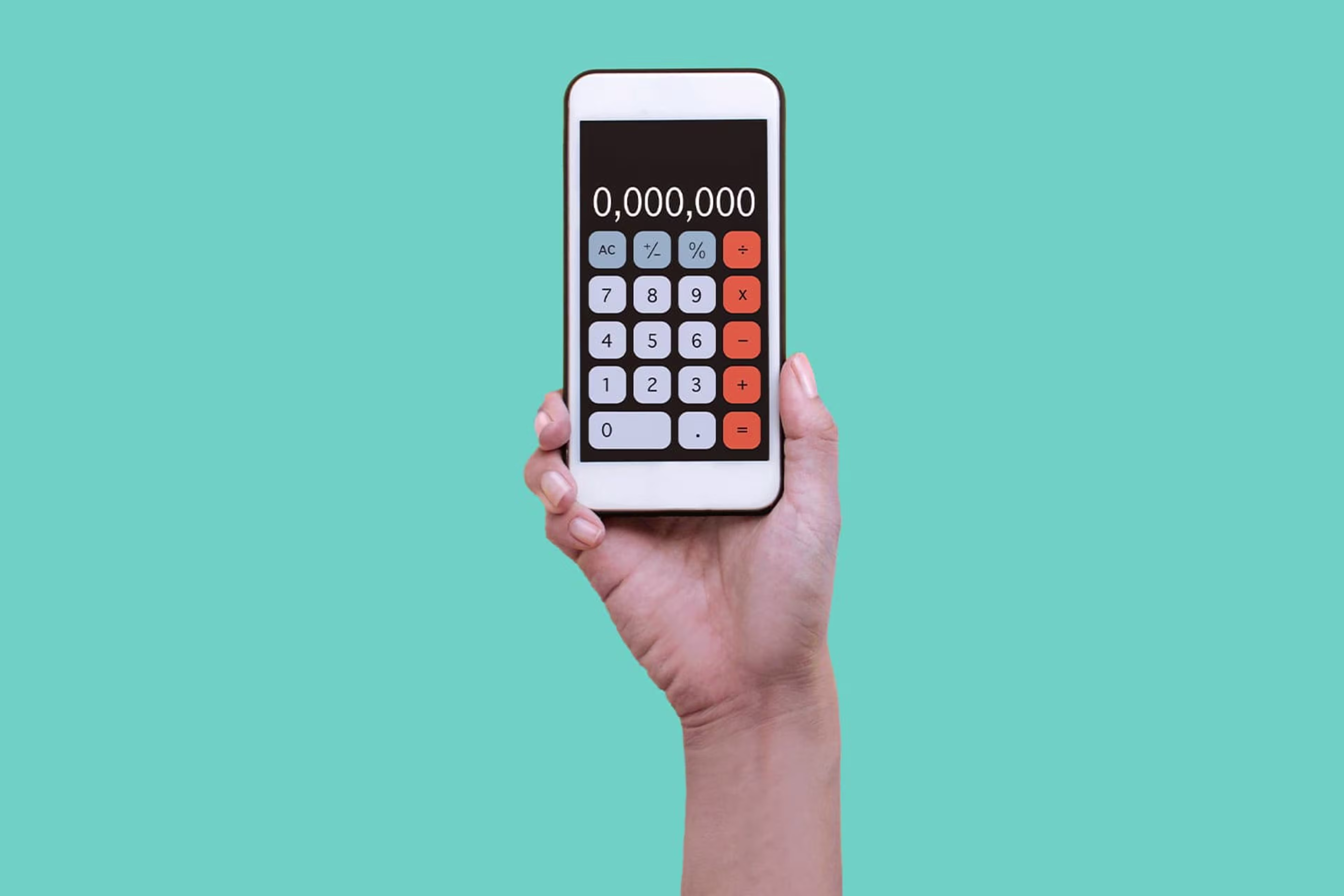 Hand holding up phone with calculator on it