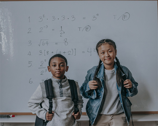 Kids in Class with Backpacks