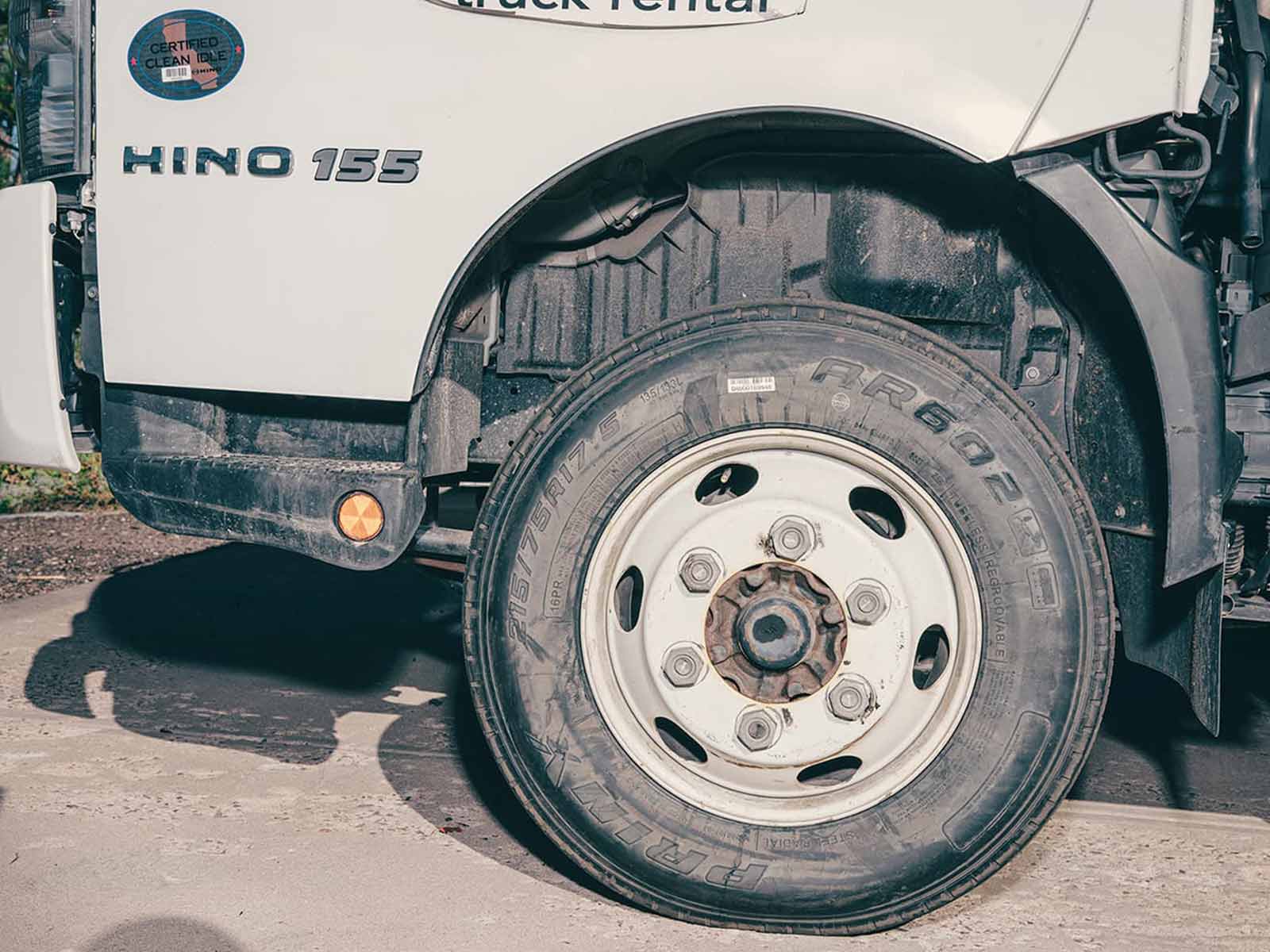 Close-up of wheel of large white semi-truck